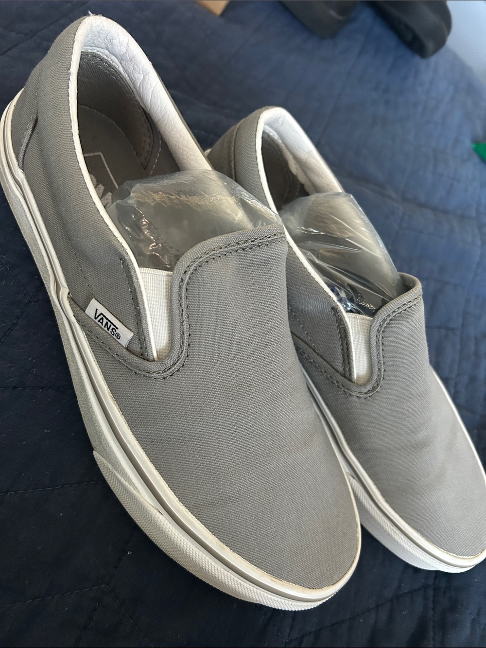 Vans Slip-On Canvas Sneakers in Gray and White